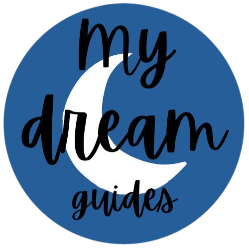 My Dream Guides Logo. A white crescent moon on a blue background